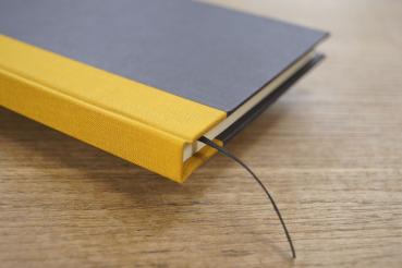 Writing and notebook black, with curry linen